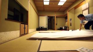 Making up a futon bed at Japanese traditional Ryokan [upl. by Llennoc9]