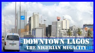 Downtown LAGOS NIGERIA  Discover the African megacity  From Balogun market to VI Ikoyi and Lekki [upl. by Ursola]